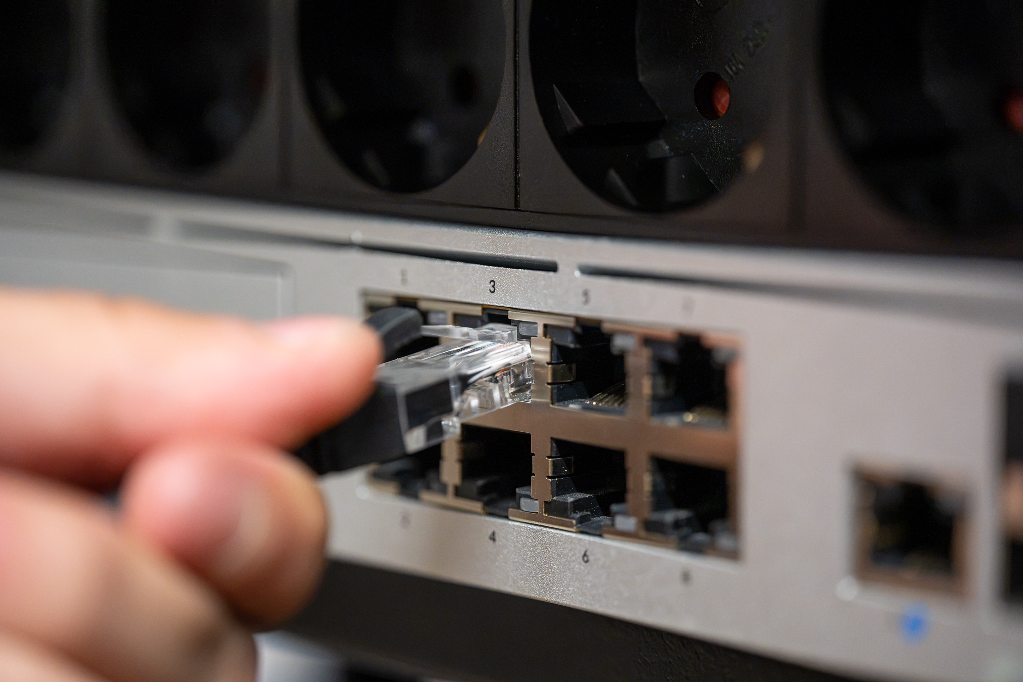 Hand patching network cables into a switch